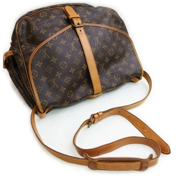LOUIS VUITTON Saumur 35 Monogram
Messenger Crossbody Saddle Bag - Picture 11 of 13